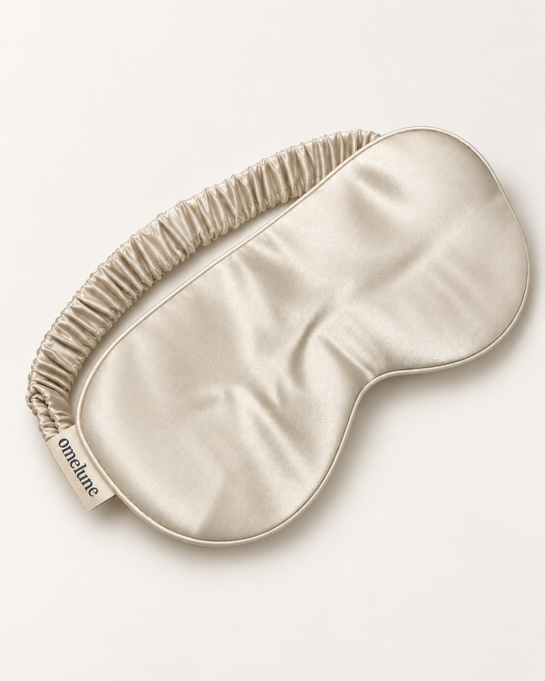 Omelune Silk Eye Mask i champagnefarget mulberrysilke